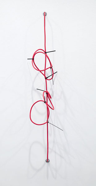 Jennie C. Jones SHHH, The Red Series #4, 2014 Noise cancelling instrument cable, cable ties and endpin jacks 37.75 x 8 x 10 inches 95.9 x 20.3 x 25.4 cm Photo: courtesy Sikkema Jenkins & Co.